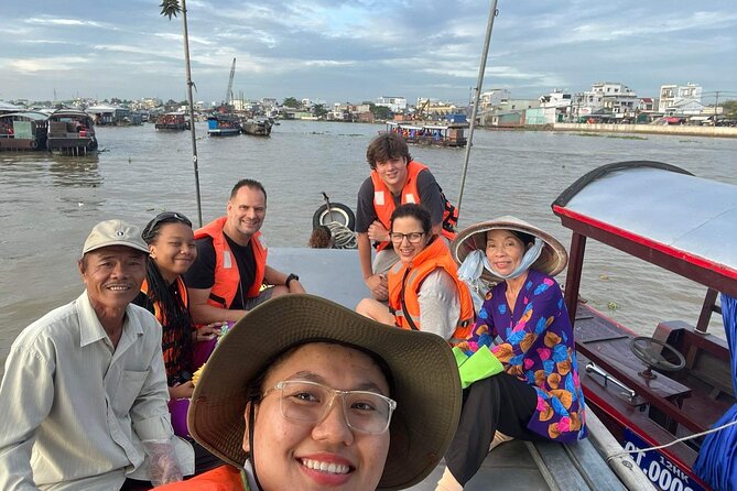 1-Day Cai Rang Floating Market-Biking & Cu Chi Tunnel Trip - Cai Rang Floating Market: Long Poles, Stilts, and Boat Snacks