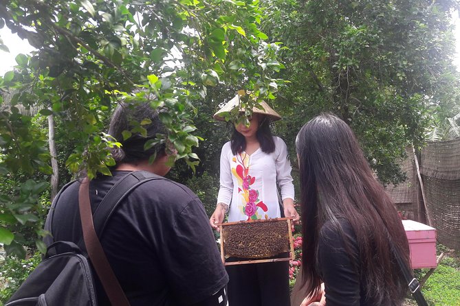1-day Mekong Delta Tour: Cai Be Market, Local Island and Cycling - Guides turn a day trip into a story