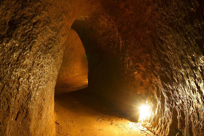 Chu Chi Tunnel With Cao Dai Temple Tour From Ho Chi Minh - Cu Chi Tunnels: video setup, underground life, and the tea-cassava finish