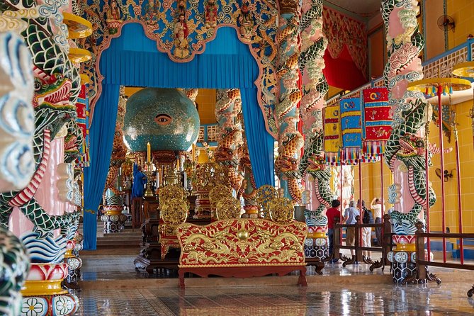 Chu Chi Tunnel With Cao Dai Temple Tour From Ho Chi Minh - Cao Dai at the Great Holy See Temple: holy eye, midday mass, and what you’re seeing