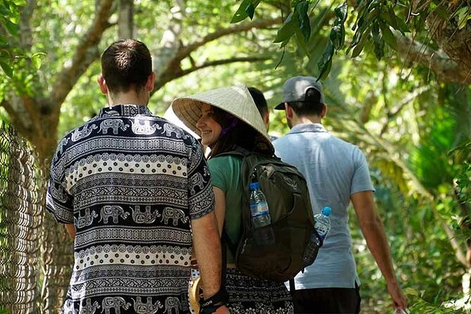 Cu Chi Tunnels & Mekong Delta: Private Full-Day Tour with Lunch - From Saigon Opera House pickup to a real Mekong road day