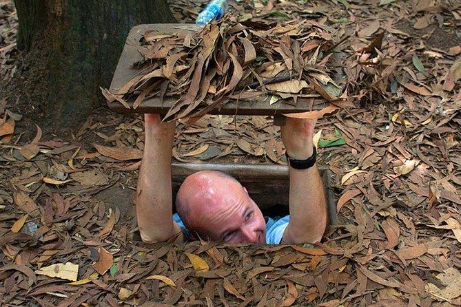 Cu Chi Tunnels underground half day tours - Entering the tunnel complex: your guide’s job starts before you crawl