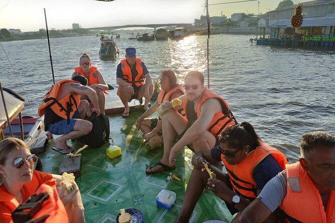 Deluxe Mekong Delta Tour to Floating Market 2 Days 1 Night Trip - Ben Tre village walk: coconut candy, honey tea, honey wine, and music