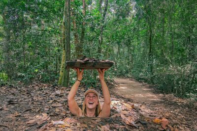 Explore Cu Chi Tunnels & Saigon History 1 Day Tour - Entering the Cu Chi Tunnels: booby traps, crawl time, and that tank touch