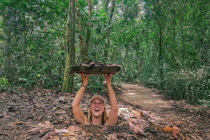 Explore Cu Chi Tunnels & Saigon History 1 Day Tour - Entering the Cu Chi Tunnels: booby traps, crawl time, and that tank touch