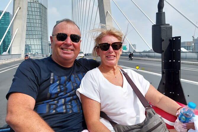 Explore HCMC by US Army Jeep: History & Food - Nguyen Hue Street, Bitexco views, and Ba Son Bridge