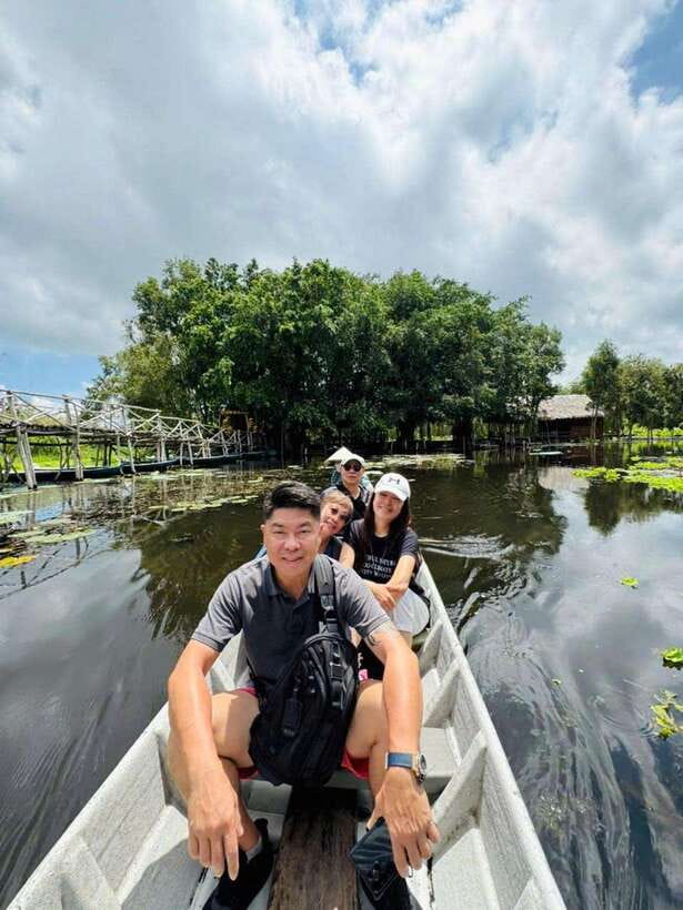From Ho Chi Minh City: Tan Lap Floating Village Eco Day Tour - The wooden boat ride: the Mekong, slowed down