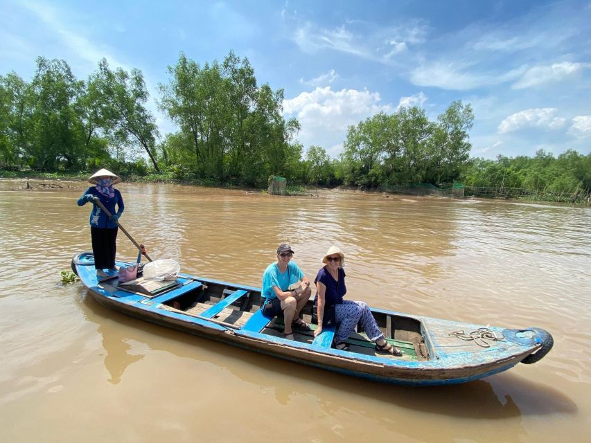 From Ho Chi Minh: Explore Vietnam's Rural Mekong Delta - Vinh Trang Pagoda: giant Buddhas and mixed-era architecture in My Tho
