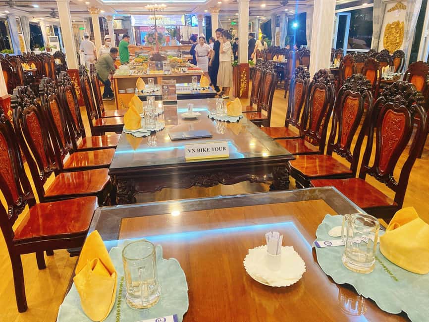 From Ho Chi Minh: Private Table Dinner on cruise Saigon - The view: illuminated bridges, landmarks, and where to focus your photos