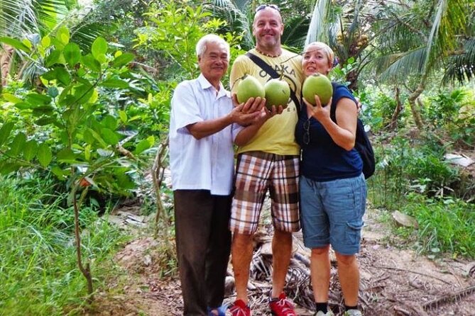Ho Chi Minh: Best Price Should Visit Mekong Delta - Ben Tre coconuts: candy stop, shaded canal rowing, and island bike time
