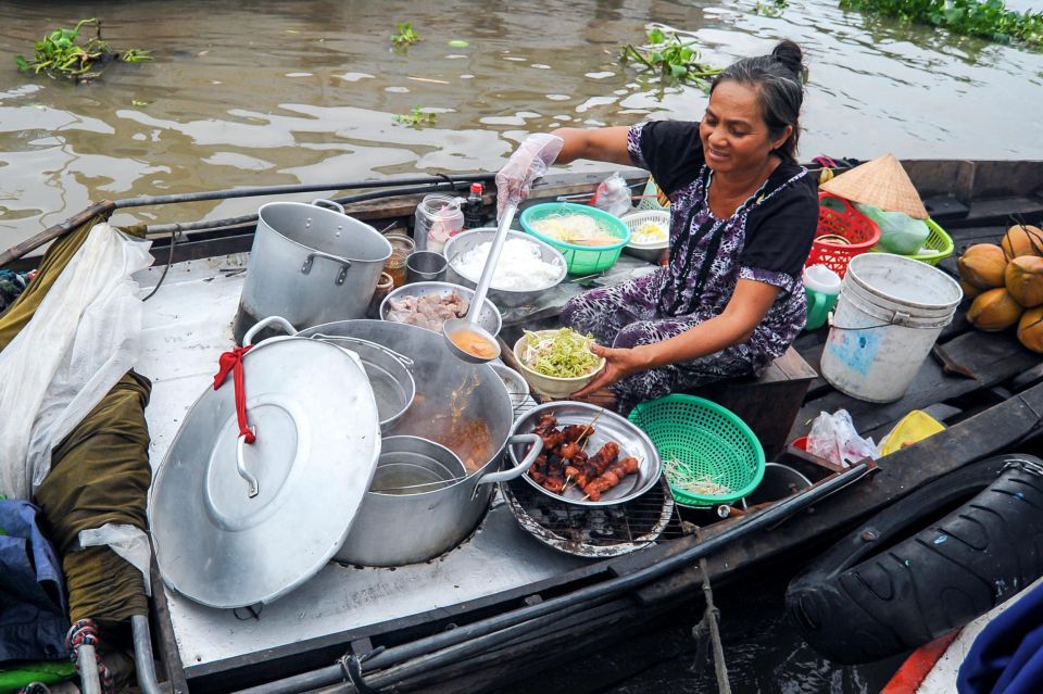 Ho Chi Minh City: Mekong River Delta Day Trip with Boat Trip - Tân Phong Island: orchards, workboats, and guided time on the island