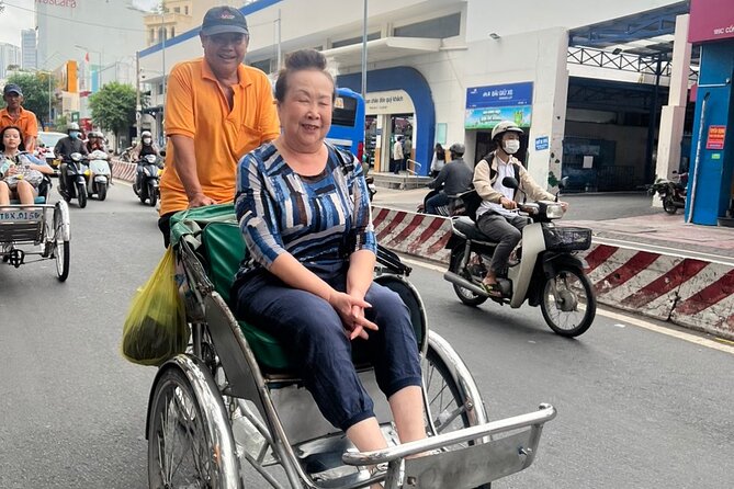 Ho Chi Minh City Sightseeing Panoramic Cyclo Private Tour - Route highlights around District 1: cathedral, Nguyen Hue, City Hall, and the Opera area