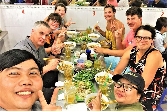 Ho Chi Minh city Street Food by scooter tour | female driver - The route: flower market, banh xeo, and a 1968 apartment glimpse