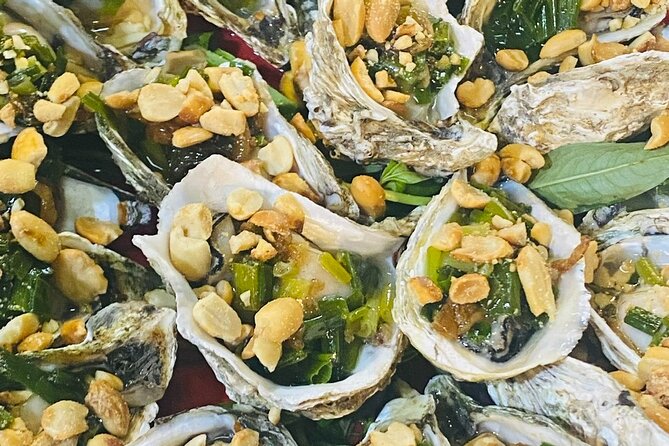 Ho Chi Minh City: Street Food & Sightseeing Tour with Local Guide - Stop 5: Trần Nhân Tôn dessert in a food-market setting