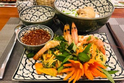 Immersive Cooking Class & Wet Market Tour by Local Chef +Cookbook - The kitchen setup in District 1: cooking with your own station