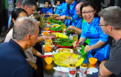 KISSTOUR | Motorbike Food Tour Female Drivers in Ho Chi Minh - Scooter ride through multiple districts: what you’re really seeing