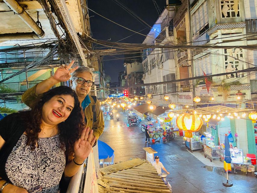KISSTOUR| Saigon By Night & Street Food Tour on Motorbike - Wartime-era apartments: seeing the older face of Saigon after dark