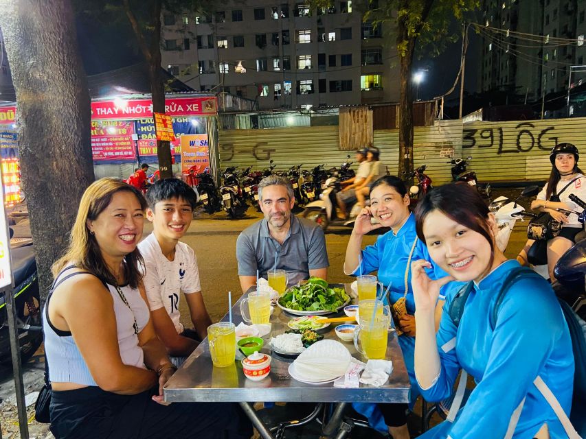 KISSTOUR| Saigon By Night & Street Food Tour on Motorbike - Pickup, helmets, fuel, and ao dai: how the tour sets you up fast