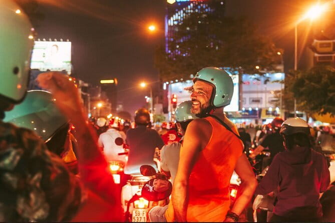 Night Food Tour in Saigon By Scooter - Meeting point in District 1 and what “pickup offered” means