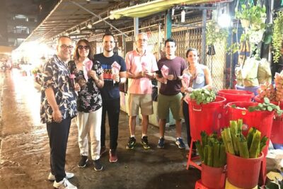 Private Craft Beer and Sightseeing Adventure Tour on Scooter in Ho Chi Minh City - Stop 1: Nguyen Thien Thuat apartment buildings and everyday local life
