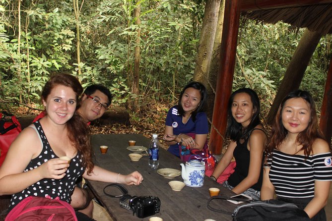 Private Cu Chi Tunnels and Mekong Delta full day - Orchard gardens, fresh fruit, and Don ca tai tu folk music