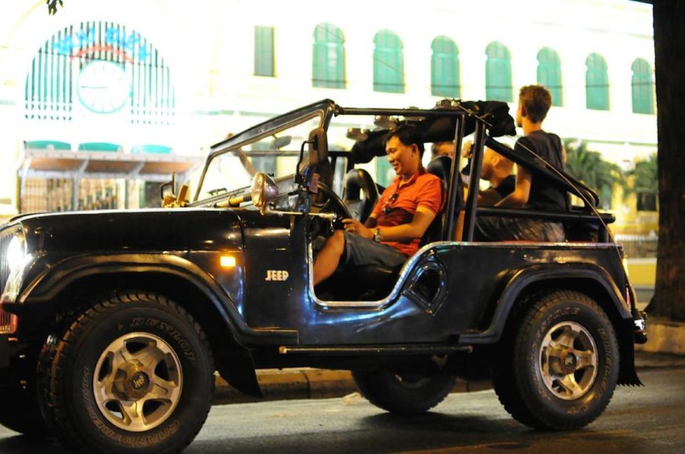 Private Jeep Tour Saigon by Night & Cruise Dinner with Music - City monuments at night: Opera House, City Hall, Notre Dame, and more