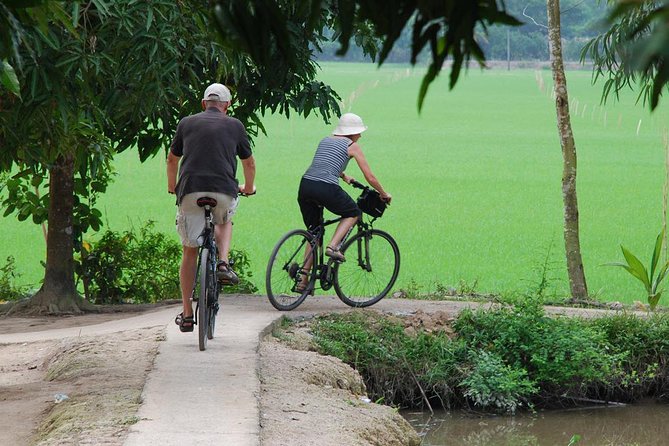 PRIVATE LUXURY Mekong 1 Day with Biking, Fishing, Cooking Class & BBQ LUNCH - Getting out of Ho Chi Minh City: the 75-minute rhythm