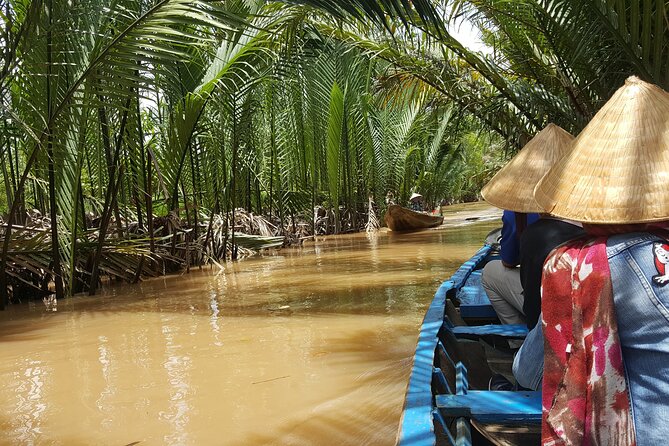 Private Mekong Delta Less Tourist - Coconut Island Tour - Ben Tre Province: canals, pomelo, honey tea, and island sounds