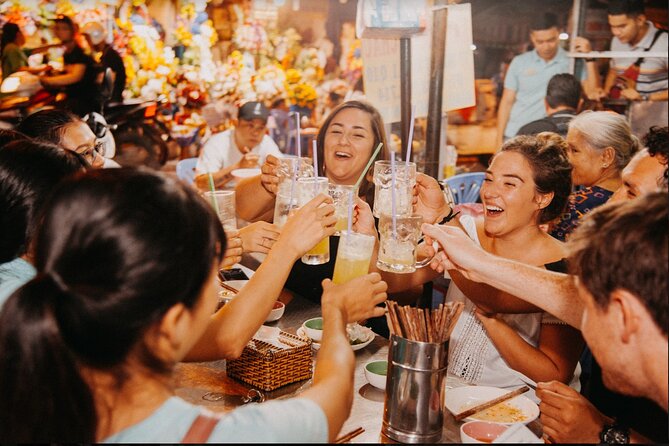 Saigon After Dark With Seafood, Beer & Live Music Bar - A motorbike evening that feels like street-level Saigon