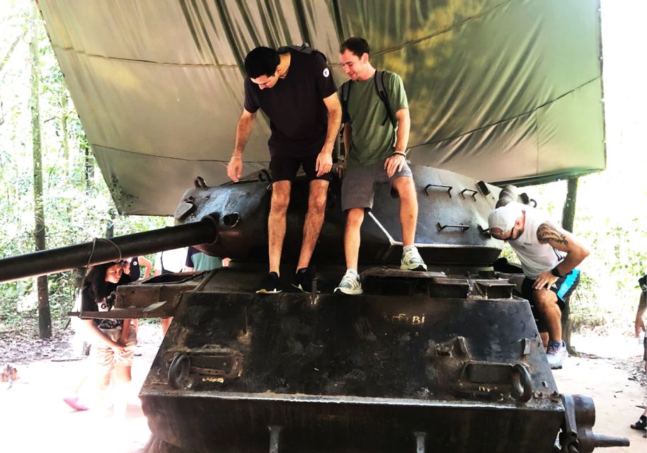 Saigon History & Cu Chi Tunnels with War Museum 1-Day Tour - Touching the ex-US Army tank: simple, memorable, and a little surreal