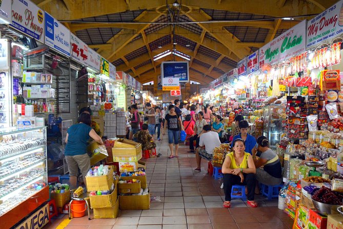 Saigon in a Day: Ho Chi Minh City Sightseeing and Night Food Tour - Dong Khoi and downtown landmarks: Saigon Cathedral, Opera House, and Central Post Office vibes