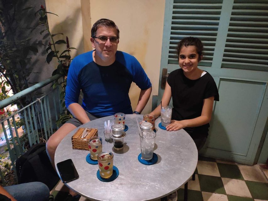 Saigon: Night Sightseeing And Street Food Tour By Vespa - Stop 1: grilled pork vermicelli and spring rolls to start the ride