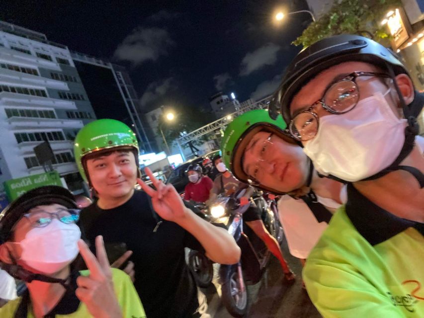Saigon: Night Sightseeing And Street Food Tour By Vespa - District 5 fashion streets to District 4 legendary bread: a crispy, sauce-forward finish