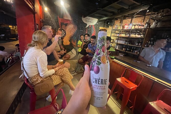 Saigon Night Street Food and Craft Beer Tour by Vespa Scooter - Stop 5: local seafoods and beers to close strong