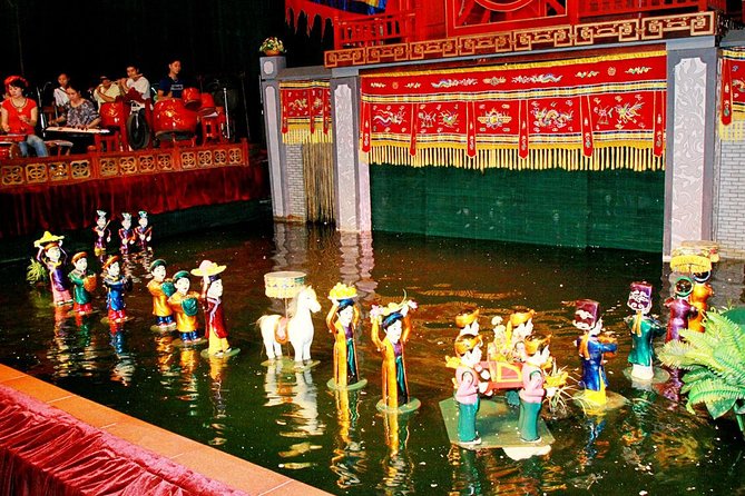 Water Puppet Show & Dinner on Cruise in Ho Chi Minh city - Boarding at Tàu Bến Nghé: Dinner Cruise on a Classic Junk